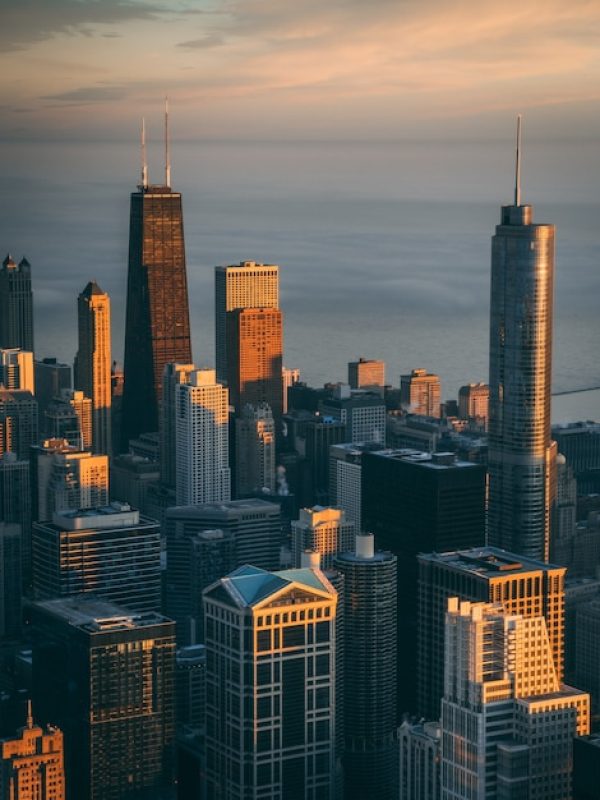 mesmerizing-view-high-buildings-skyscrapers-with-calm-ocean_181624-14996[1]